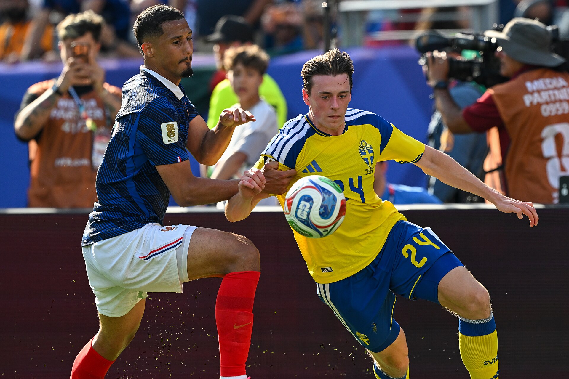 EAST RUTHERFORD, UNITED STATES - June 30: William Saliba #17 is in action against Elliot Stroud #24 of Sweden during the FIFA World Cup 2026 round of 32 match between France  and Sweden on June 30, 2026 MetLife Stadium, East Rutherford, New Jersey