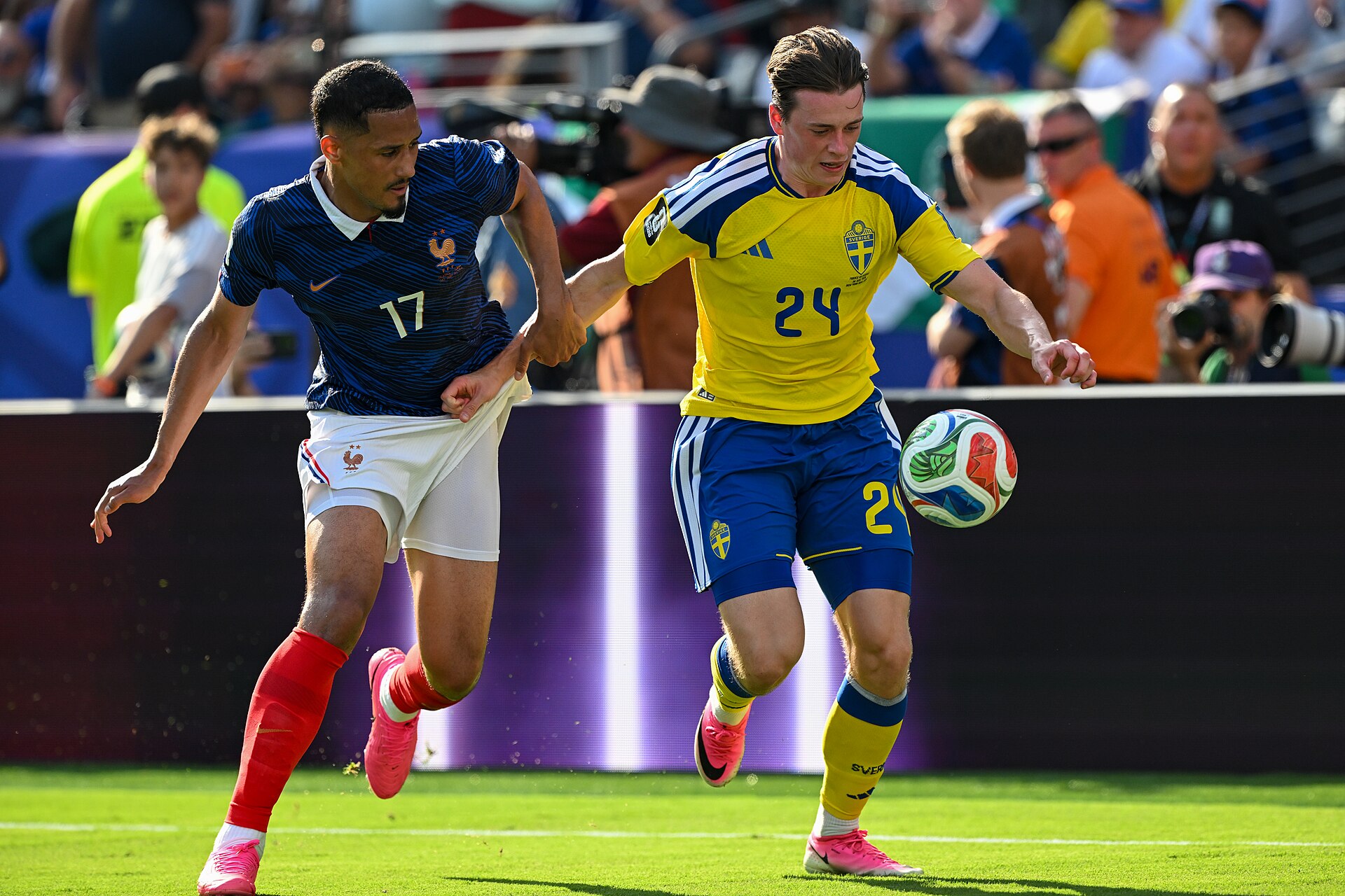 EAST RUTHERFORD, UNITED STATES - June 30: William Saliba #17 is in action against Elliot Stroud #24 of Sweden during the FIFA World Cup 2026 round of 32 match between France  and Sweden on June 30, 2026 MetLife Stadium, East Rutherford, New Jersey