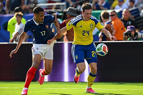 EAST RUTHERFORD, UNITED STATES - June 30: William Saliba #17 is in action against Elliot Stroud #24 of Sweden during the FIFA World Cup 2026 round of 32 match between France  and Sweden on June 30, 2026 MetLife Stadium, East Rutherford, New Jersey