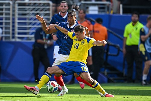 EAST RUTHERFORD, UNITED STATES - June 30: Yasin Ayari #18 of Sweden is in action against Michael Olise #11 of France during the FIFA World Cup 2026 round of 32 match between France  and Sweden on June 30, 2026 MetLife Stadium, East Rutherford, New Jersey
