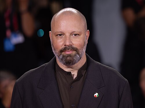Director Yorgos Lanthimos on the red carpet for the film Bugonia at the 2025 Venice Film Festival