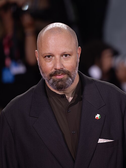 Director Yorgos Lanthimos on the red carpet for the film Bugonia at the 2025 Venice Film Festival