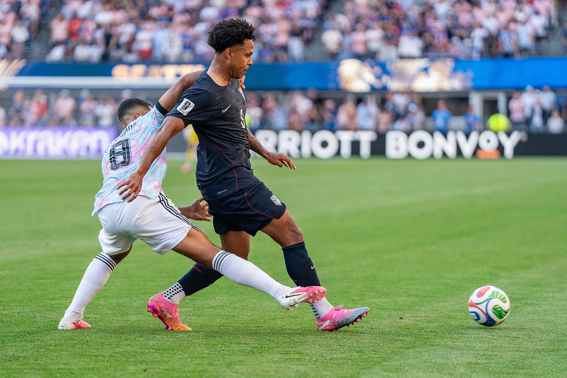 Youri Tielemans Weston McKennie during Belgium v United States at the 2026 FIFA World Cup